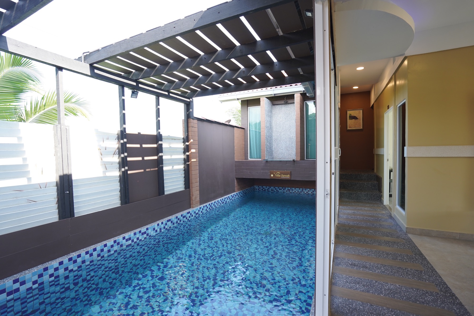 Villa Erika private pool and shaded corridor